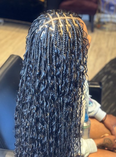 Current promotional braiding style at Miriam African Hair Braiding